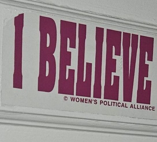 Sign on door that says; I believe Anita Hill. Women's Political Alliance 1991