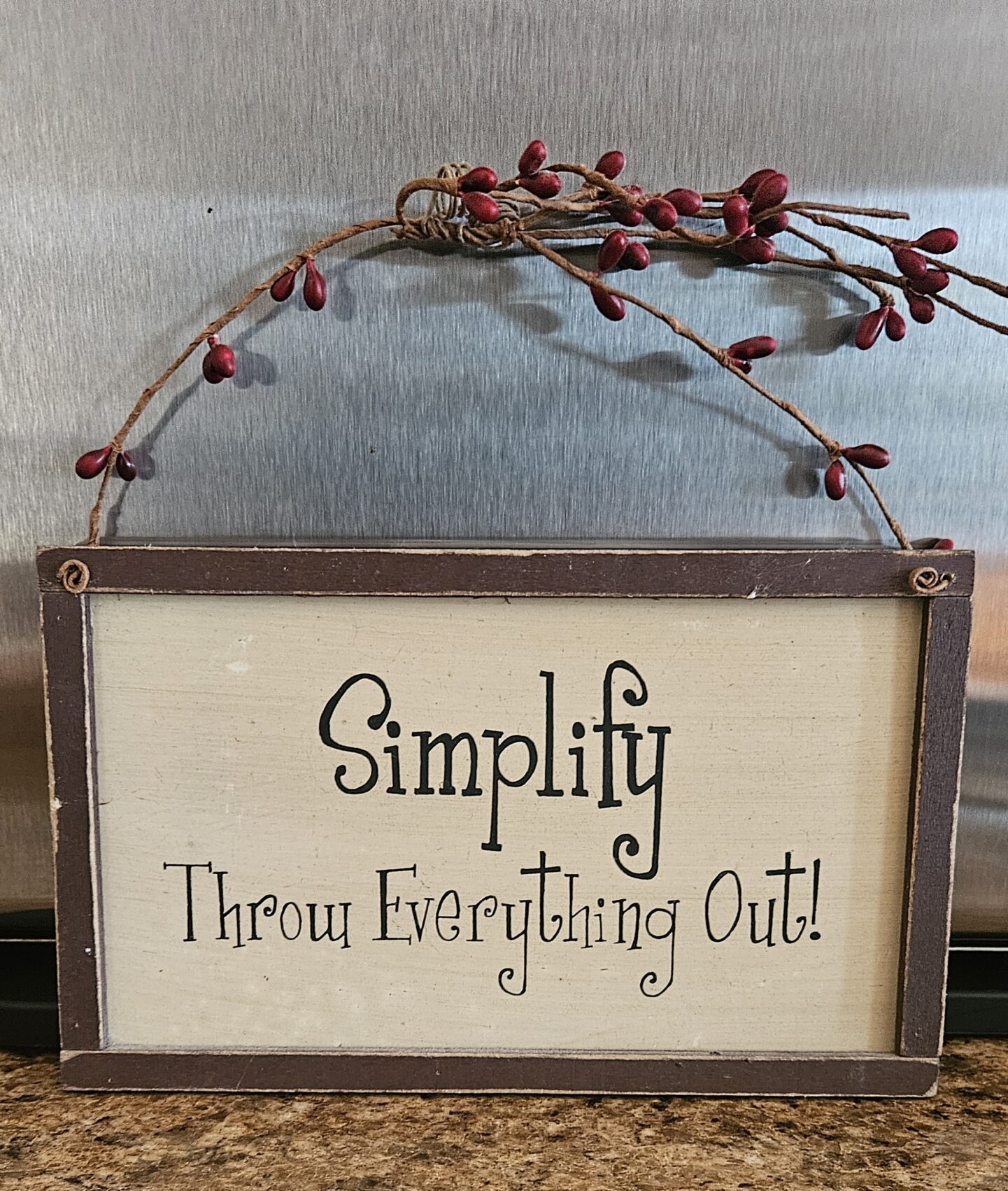 Simplify - Throw Everything Out! (Text on a sign)